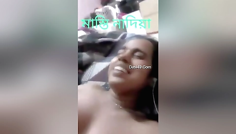 Bhabhi is wearing a sexy blouse and showing off her tits