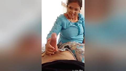 Handjob in the kitchen of a stepbrother with her 18 year-old body