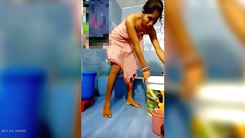 Indian brunette with round boobs is stripping naked