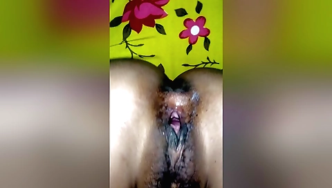 Indian girl with a sexy hairy pussy sucking long stick