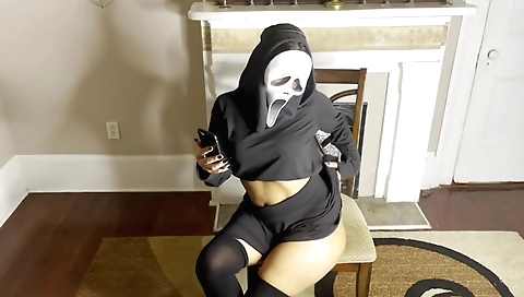 Amateur brunette doing a solo video in the halloween scene