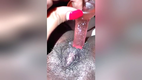 Indian amateur female masturbates with homemade sex toy