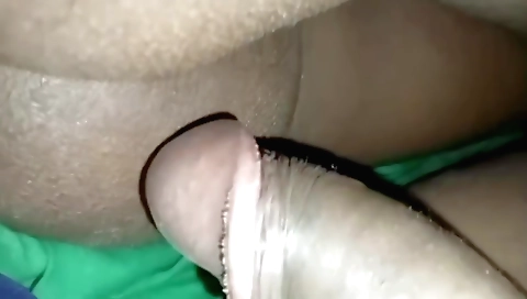 Hot amateur brunette is playing with her body in a bedroom