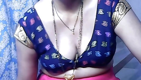 Solo video of a blonde in black lingerie taking off