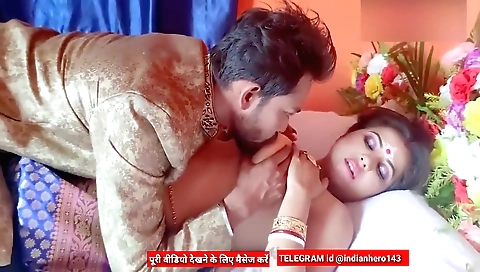 Busty indian babe enjoys her body and her braids and poses