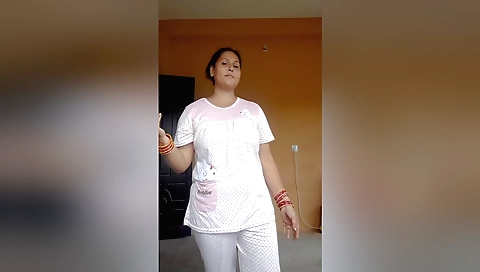 Busty brunette in black sweater and stockings solo