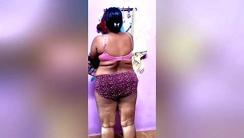 Indian girl wearing a sexy dress and blouse in bed