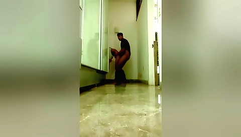 Indian babe with a shaved cunt stretching her pussy