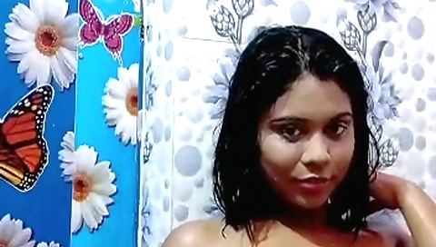 Busty brunette babe naked in the bathroom in webcam