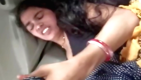 Busty brunette fucks her boyfriend in the back seat