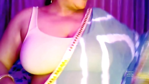 Indian girl in a sexy outfit shows her body on camera