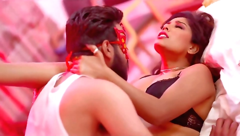 A hot milf is getting off by pressing the balls of the cock