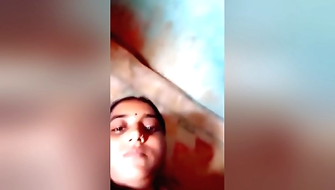 Brunette sex video shows a hot brunette in sexy dress