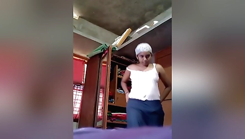 Sexy brunette naked girl with a great face on a laptop