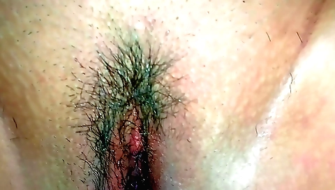 Indian girl with hairy pussy sucks dildo and fucks