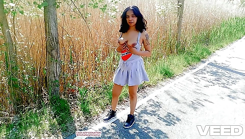 Amateur big ass mature lady with big boobs riding a bike