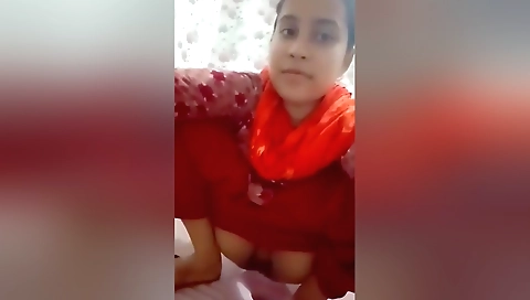 Solo girl showing her boobs and pussy in front of the camera
