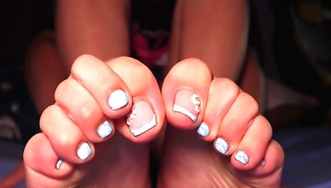 Indian girl touches her feet for a foot fetish video