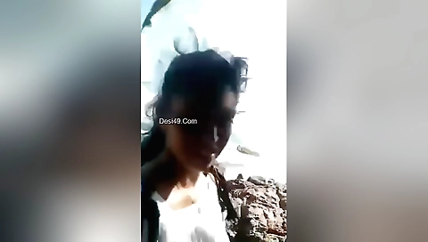 Brunette milf girl enjoying a blowjob with someone at night