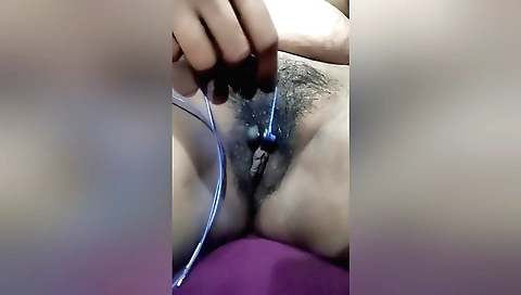 Sexy Desi Bhabhi Fingering Her Pussy With Earphones In The Bedroom