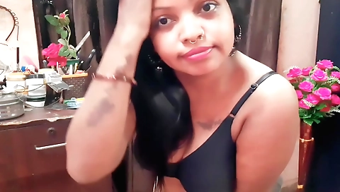 Indian brunette is showing off her boobs on webcam
