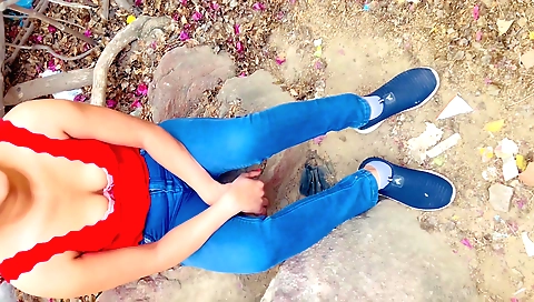 Indian hottie in a cute outfit rides her cock outdoors