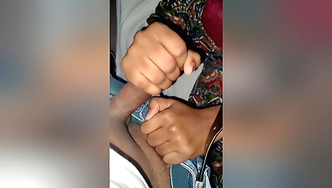 Handsome guy is doing a handjob at a train with a lady