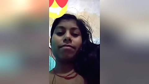 Sexy brunette is showing off her body on the web cam