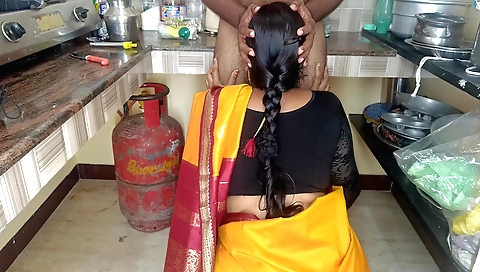 Indian housewife is fucking at home in her kitchen