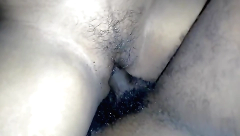 Busty brunette has a hairy pussy and is showing it in the vid