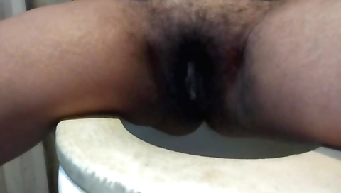 Indian slut playing with her hairy pussy and her hair
