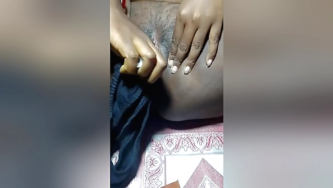 Indian girl with hairy bush gets naked and rubs her body